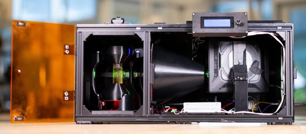 The OpenCAL printer, projector on the right, print volume on the left.