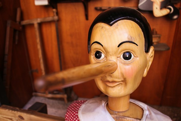A wooden doll with a long nose that has nothing to do with Disney